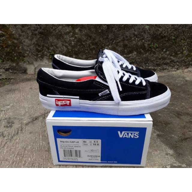 vans slip on cut and paste black