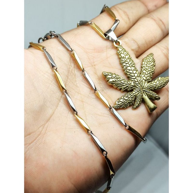 KALUNG TITANIUM RANTAI PADI BANDUL BOB MARLEY / KALUNG TITANIUM GOLD SILVER