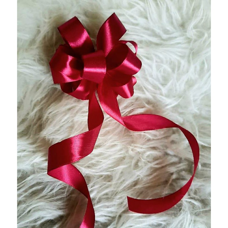 

pita kado pita parcel pita pompom