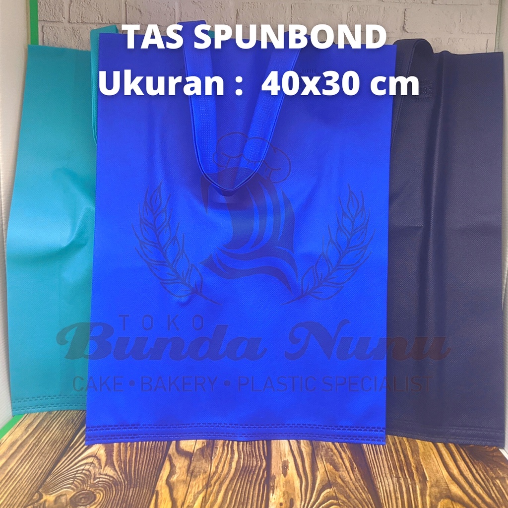 

Tas Souvenir Tas Spunbound Handle Ukuran 30x40 cm