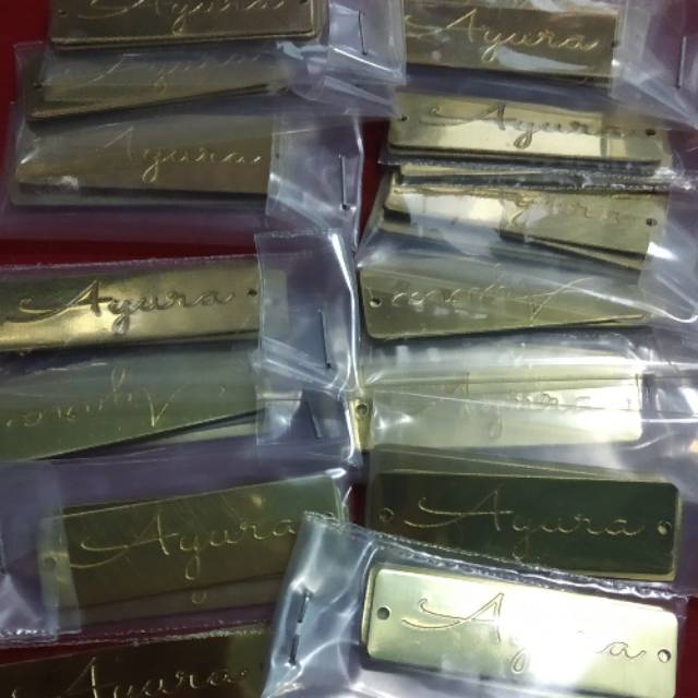 Label hijab ,merk baju ,tas ,mekena  dll