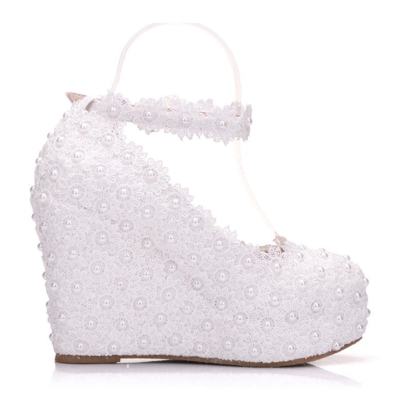 white wedge slip on