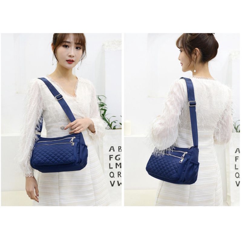 Tas selempang wanita 99018-22-8 bahan kanvas