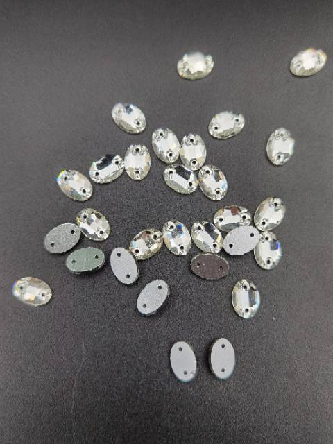STONE KRISTAL BERLIAN MOTIF BULAT OVALE WARNA PUTIH UKURAN 10 X 14 PER LUSIN