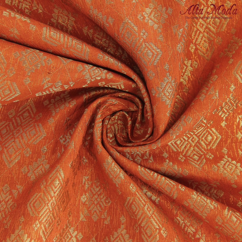

Alta Moda Songket Motif Palembang Orange Terang Mix Benang Gold (1M)