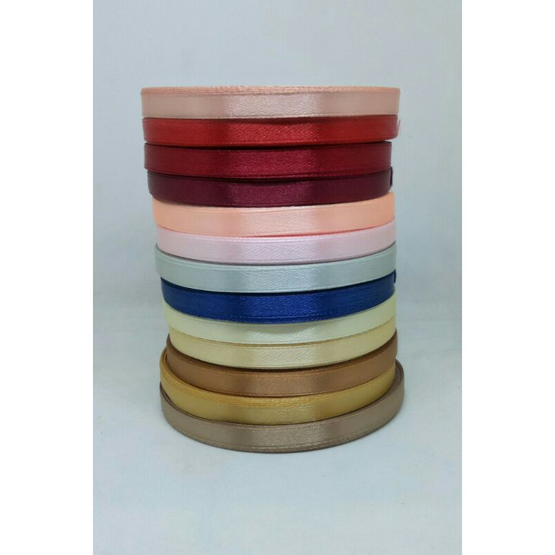 

Pita satin lebar 0.5cm aneka warna per roll 20 yard