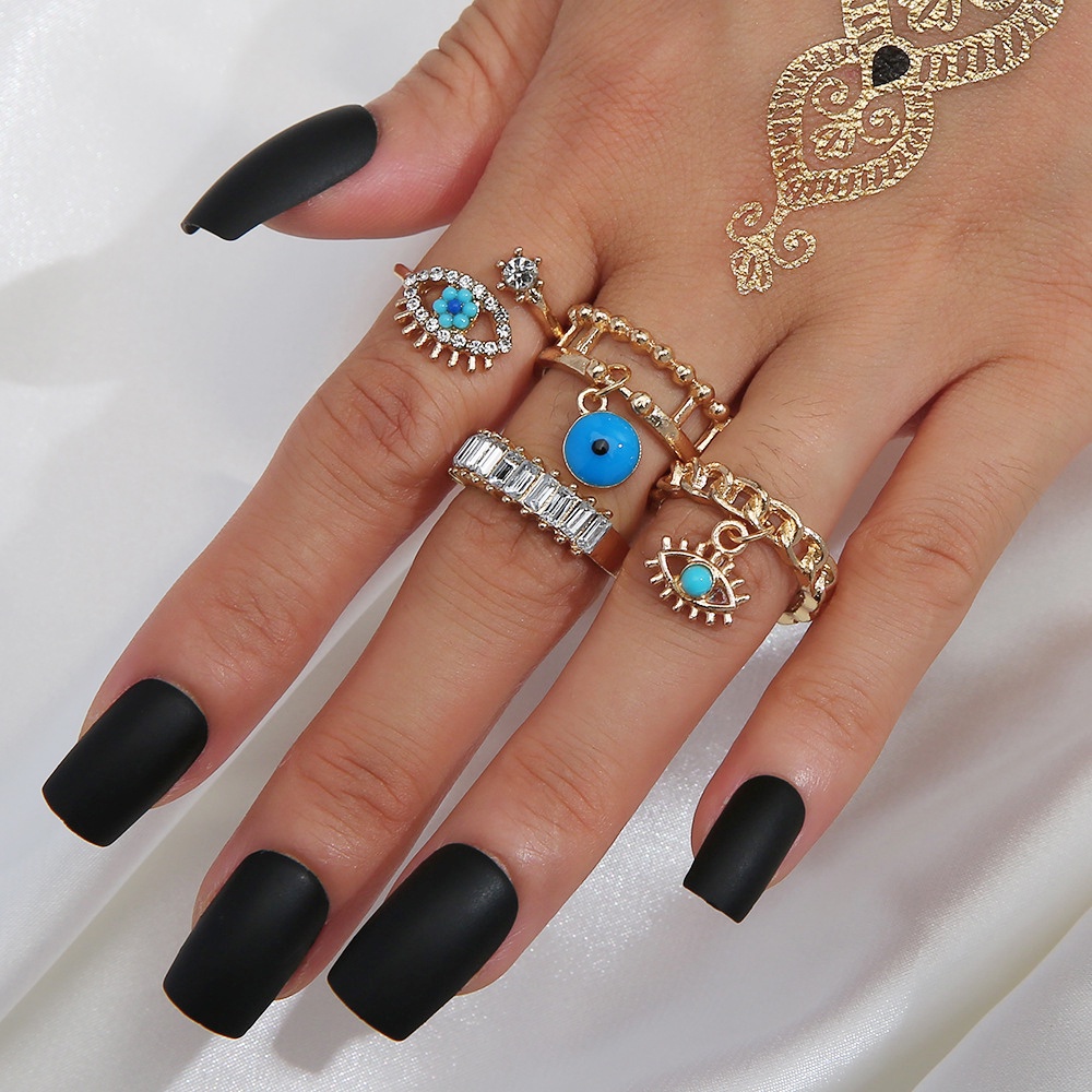 4pcs / Set Cincin Knuckle Desain Mata Iblis Aksen Kristal Warna Emas Gaya Vintage Boho Untuk Wanita