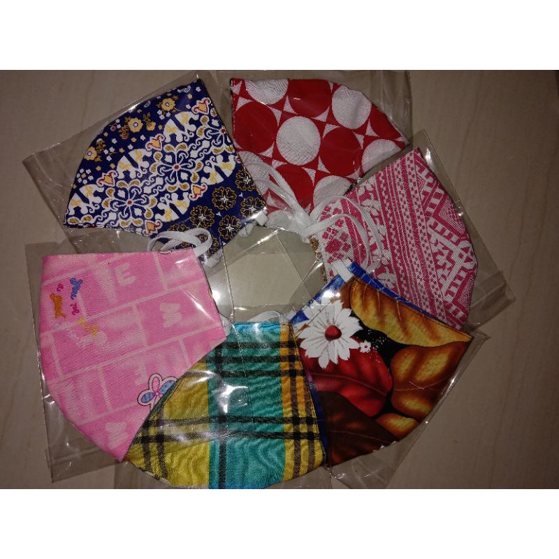 masker motif 2lapis