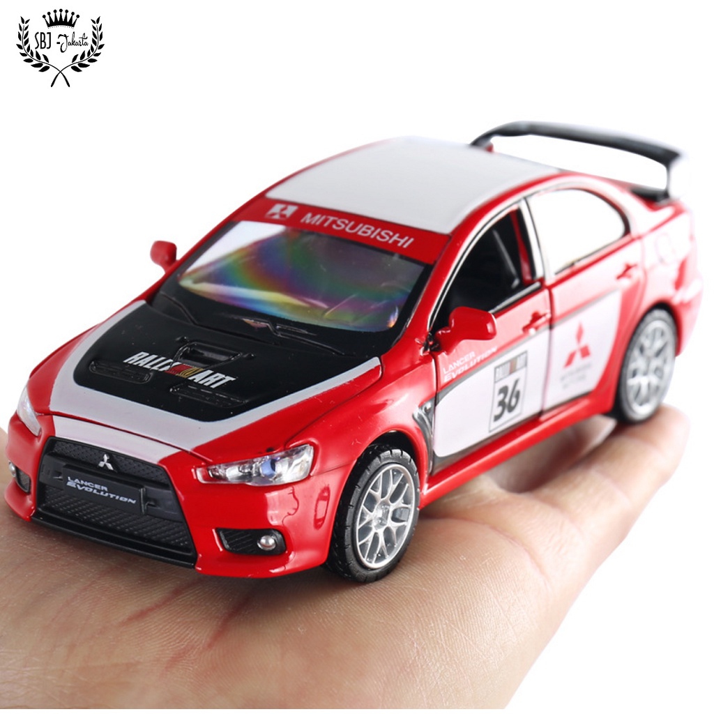 DIECAST MOBIL MITSUBISHI LANCER EVOLUTION OFFICIAL LICENSED PRODUCT RACING SKALA 1:32