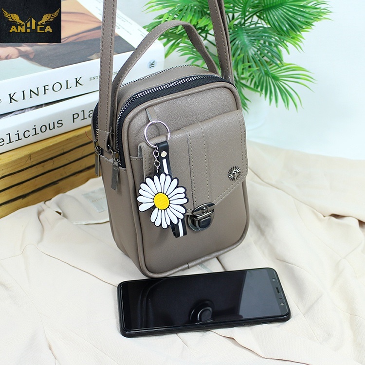 Tas Pouch Hp Wanita Minixo Kunci Slot Nekkel | tas selempang wanita | tas pouch wanita | tas selempa