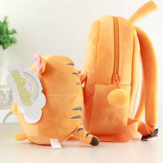 Tas ransel +  boneka pooh tiger donald stitch