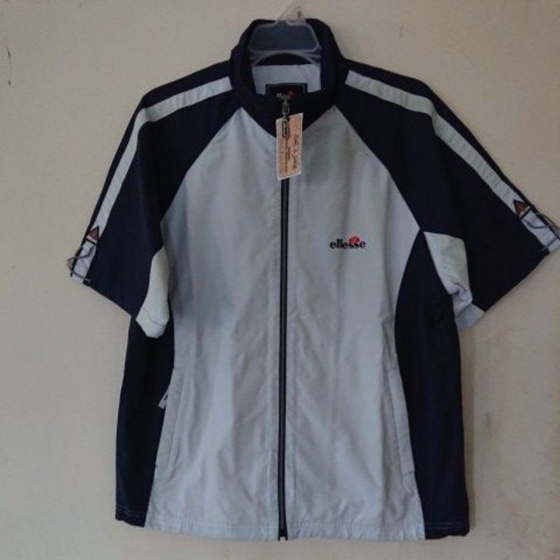 jaket tangan pendek merk ELLESSE ORI 100 %