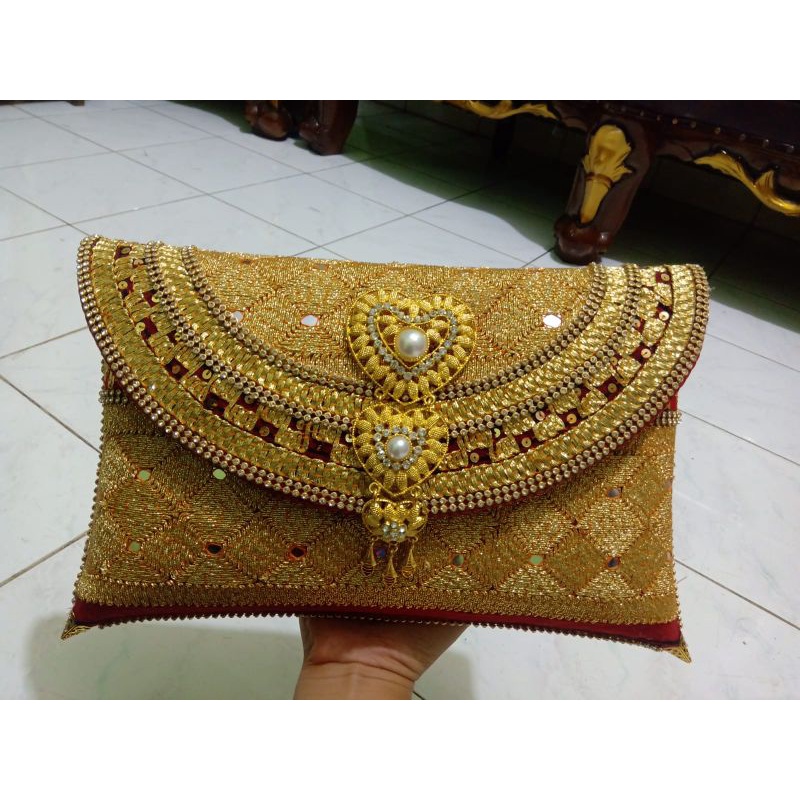 tas selempang tapis