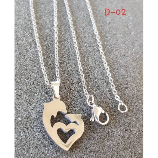 Kalung import dolphin Antikarat titanium white / kalung fashion Antikarat titanium motif dolphin