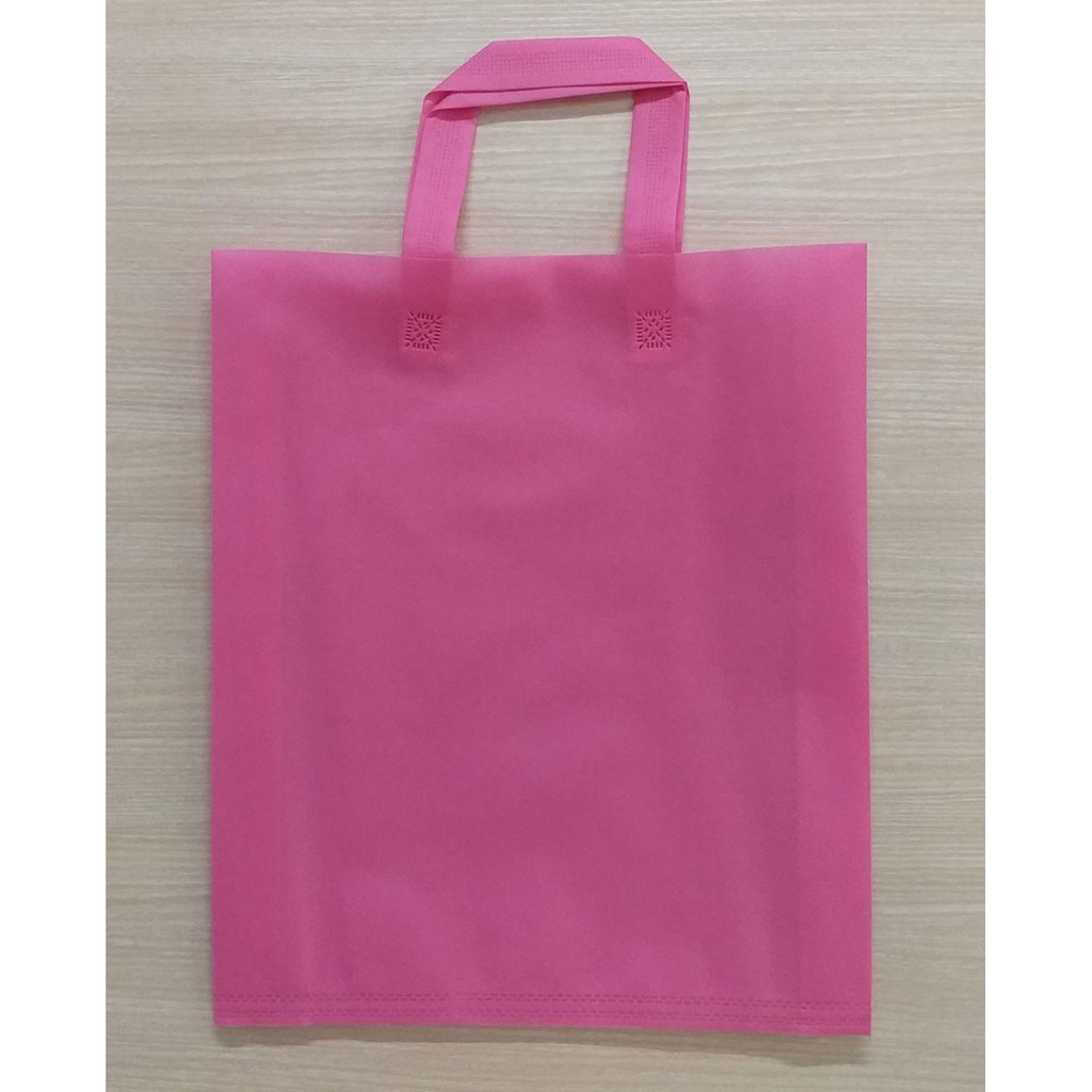 

GOODIE BAG / SPUNBOND HANDLE / Tas Belanja MURAH / Souvenir / 38x45 (Warna Pink)