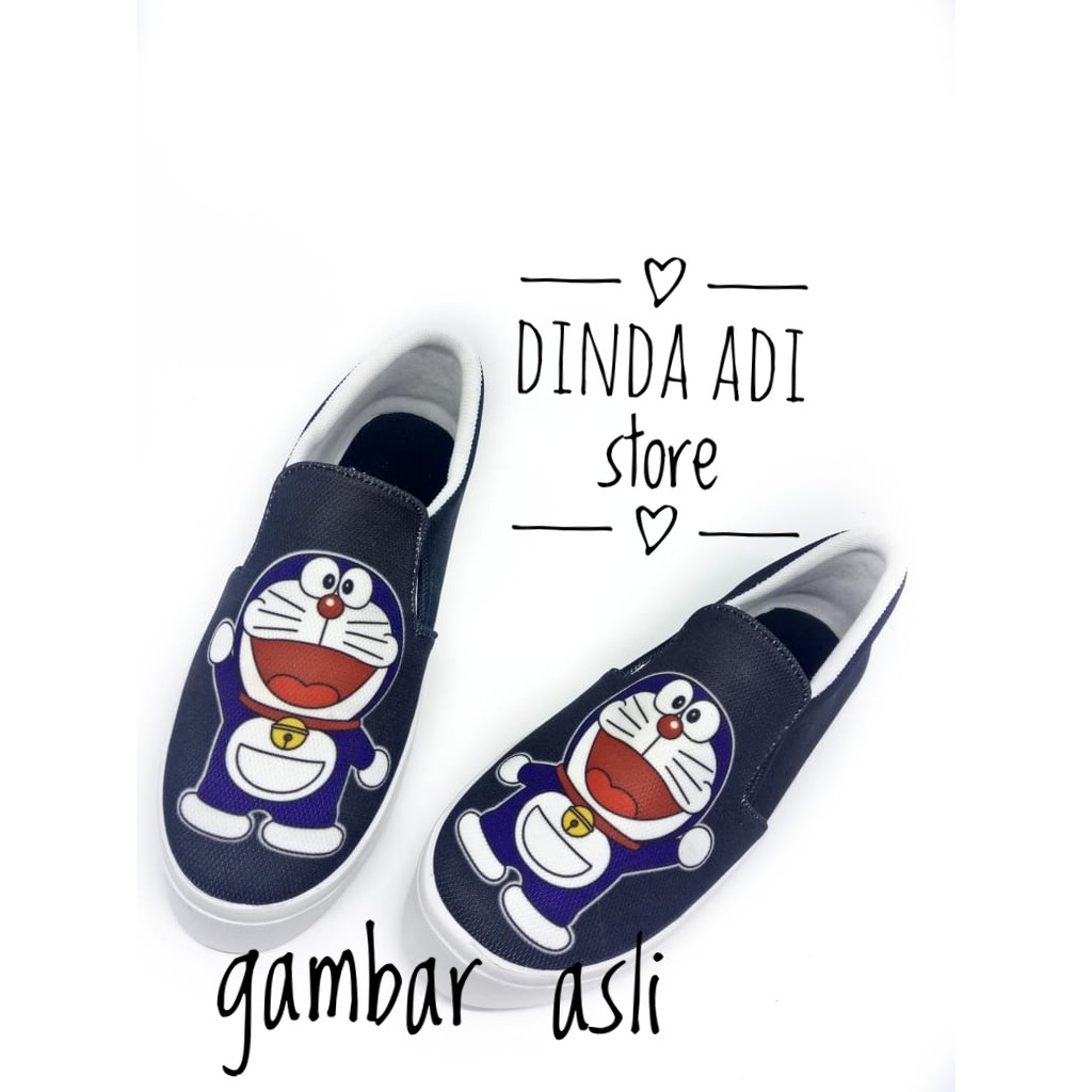 DINDA SEPATU WANITA SLIP ON DORAEMON REALPICT 100% MURAH - BIRU DAN HITAM