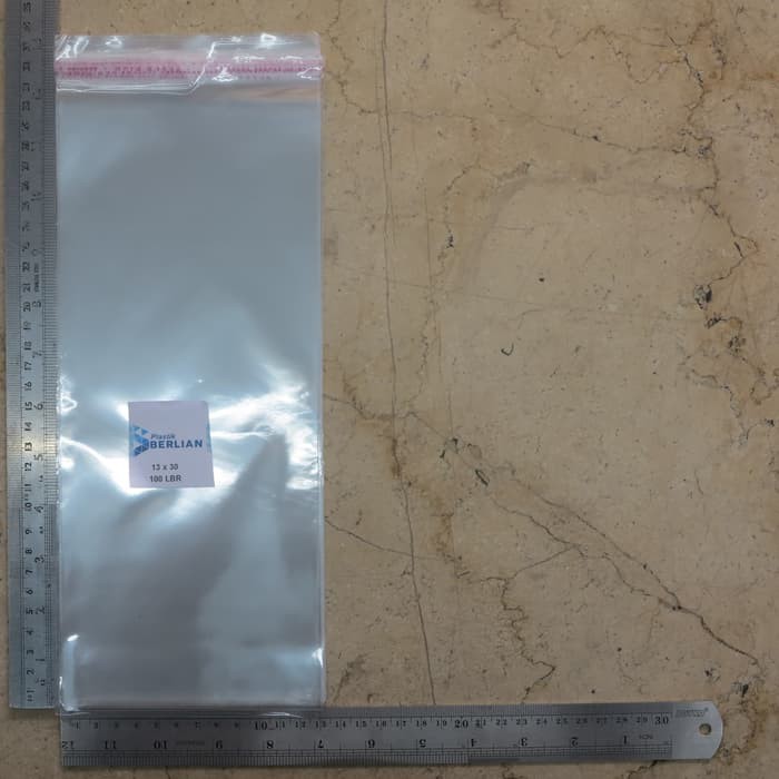 

Stok Ready Plastik OPP 13X30CM KW1 100LBR Lem atau Seal Berkualitas