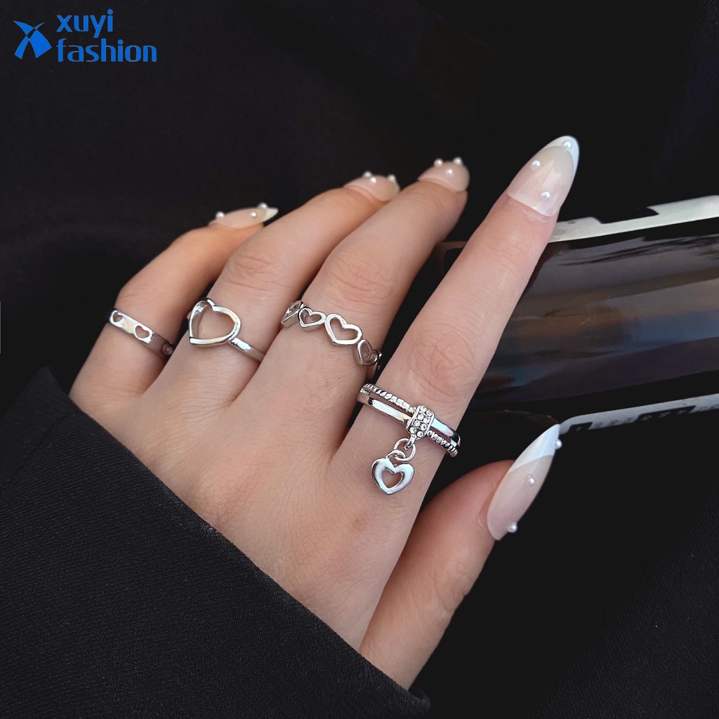 4pcs / Set Cincin Silver Desain Hati Hollow Hias Kristal Untuk Wanita