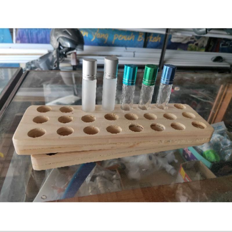 rak botol roll on,rak parfum,tatakan parfum