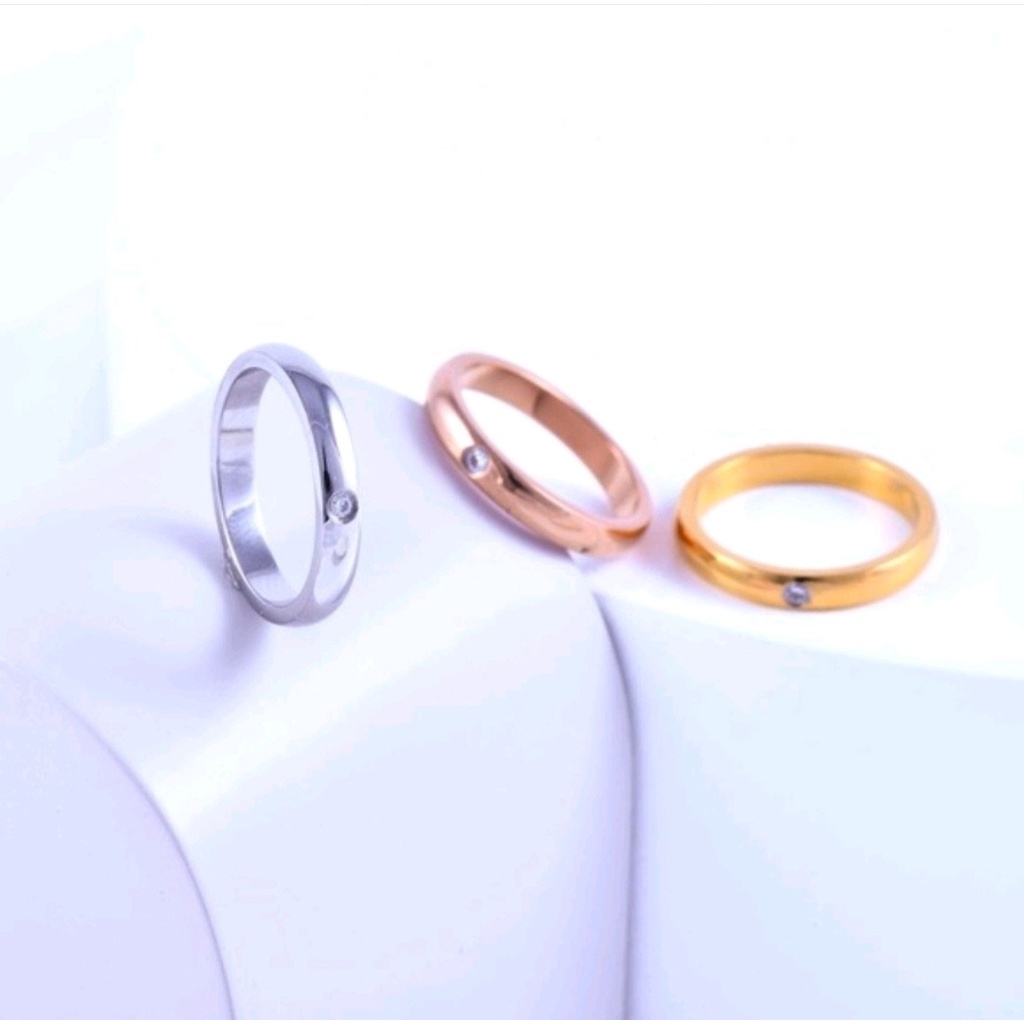 Cincin titanium/couple/tunangan permata satu bulat pria wanita keren unisex