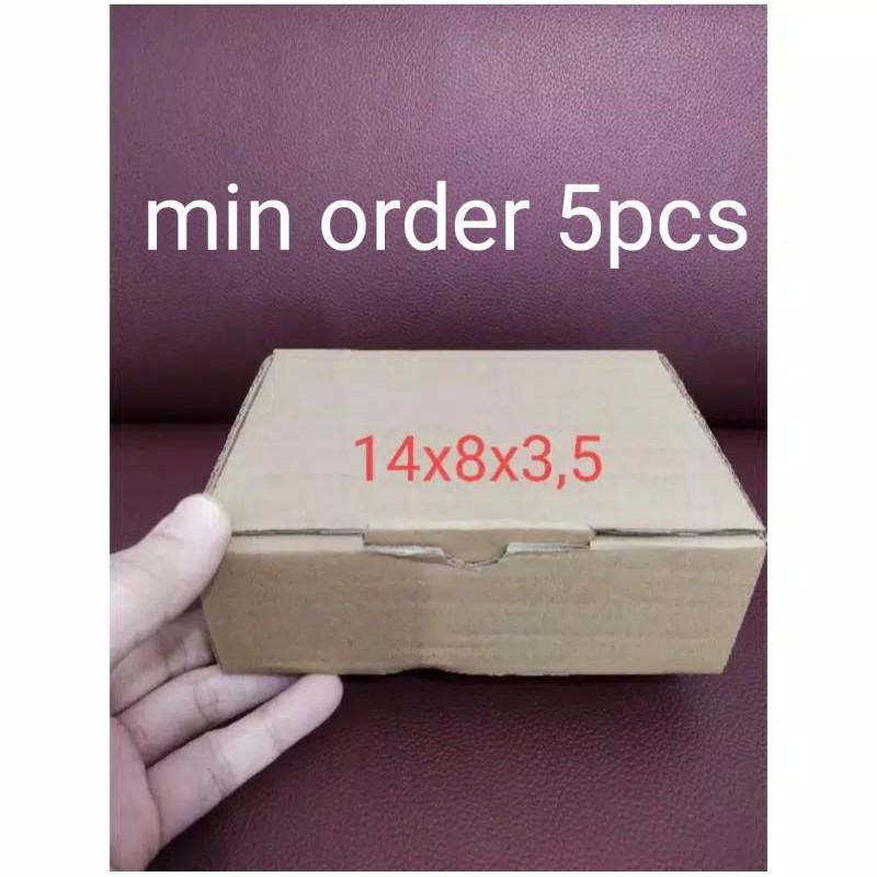 

Kardus packing die cut 14x8x3,5