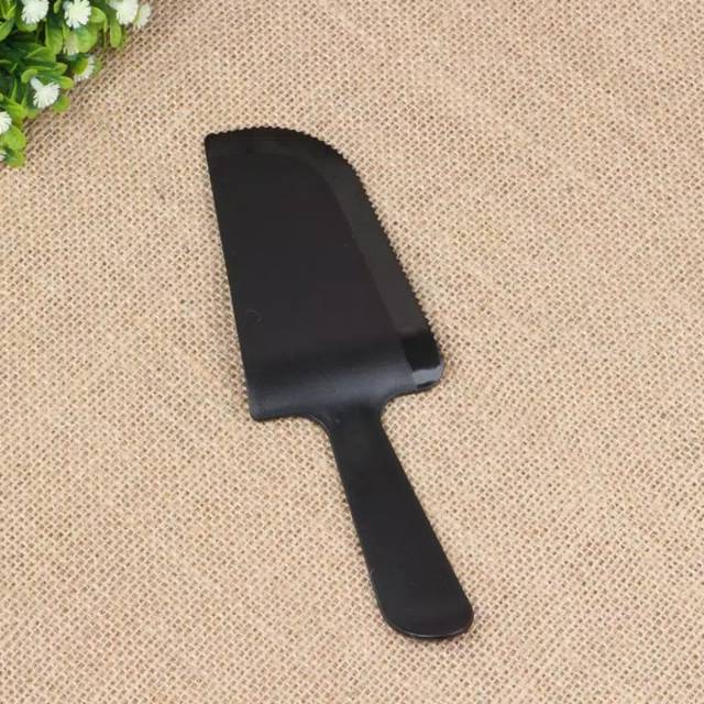 Spatula plastik bentuk pisau