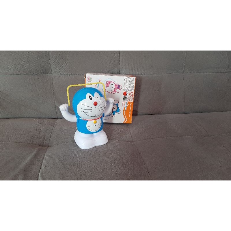 mainan robot boneka doraemon loncat guling lucu musik