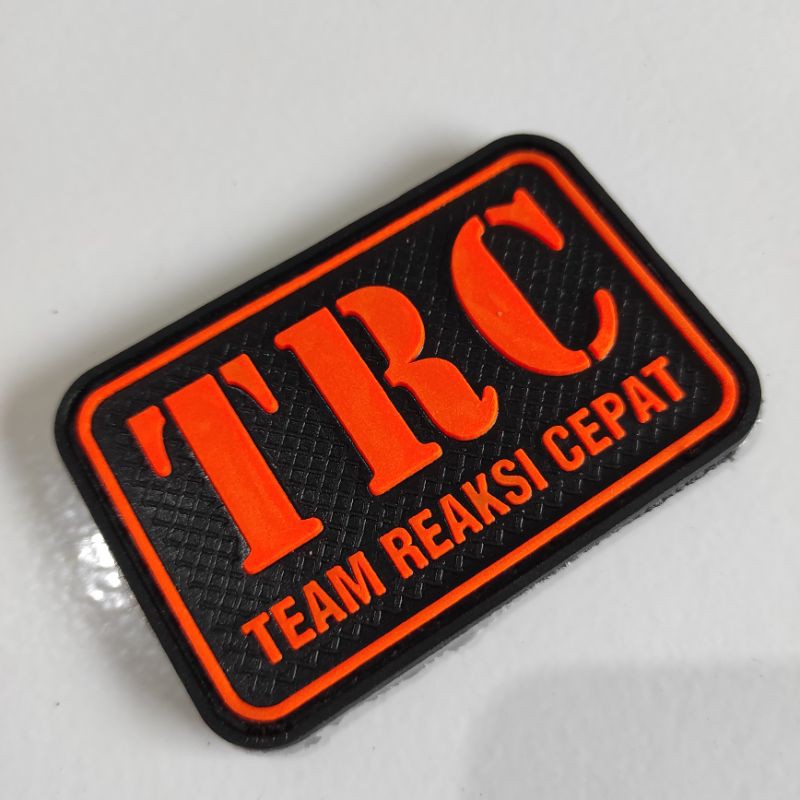 PATCH RUBBER TULISAN TRC ( TEAM REAKSI CEPAT)/BPBD/BNPB/TIMSAR/TEMPELAN EMBLEM LOGO KARET VELCRO