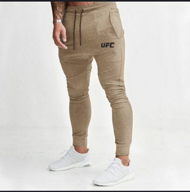 TOTOTAshop.Celana jogger UFC Unisex.bahan fleece premium