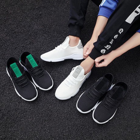 sepatu hitam sneakers kasual pria versi Korea tren sepatu terbang sepatu anyaman mesh