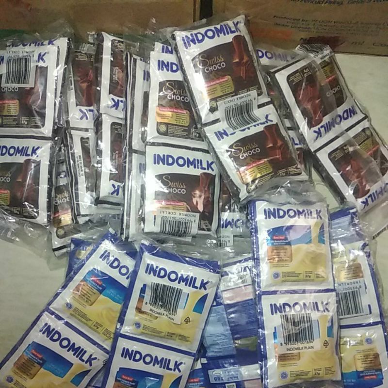 

indomilk saset isi 6 putih coklat - skm indomilk sachet