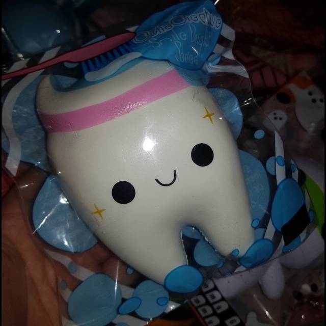 cutie creative tooth squishy