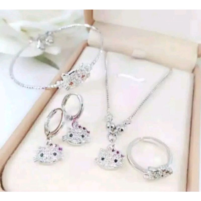 set anak anak titanium motif kepala satu HK lapis emas putih anti alergi