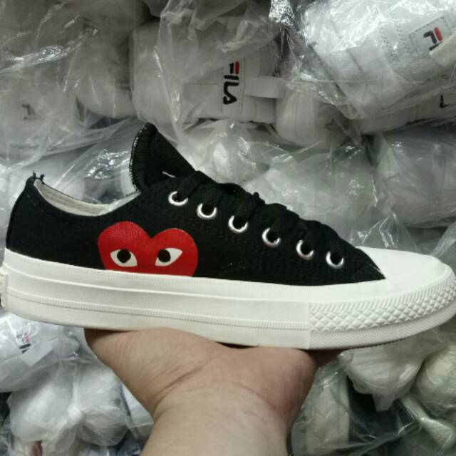 chuck taylor x cdg