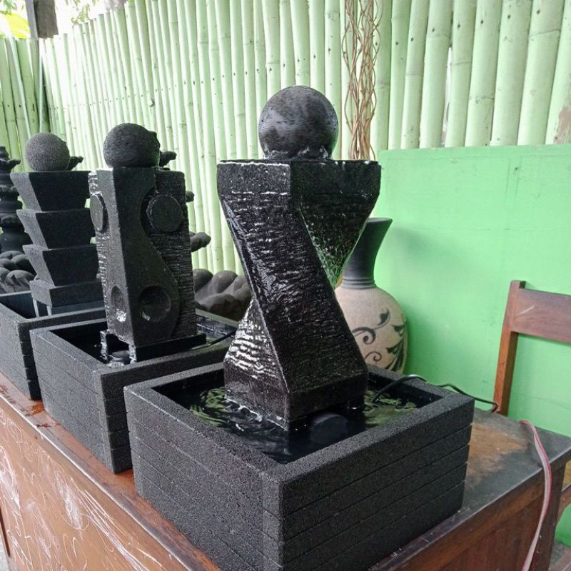 Air Mancur Bola Putar Ulir Batu Alam