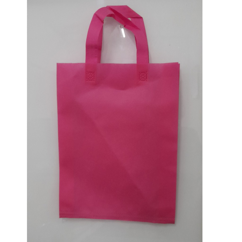 

Tas Press Spunbound Tali Goodie Bag Tas Belanja Warna Pink 30 cm x 40 cm