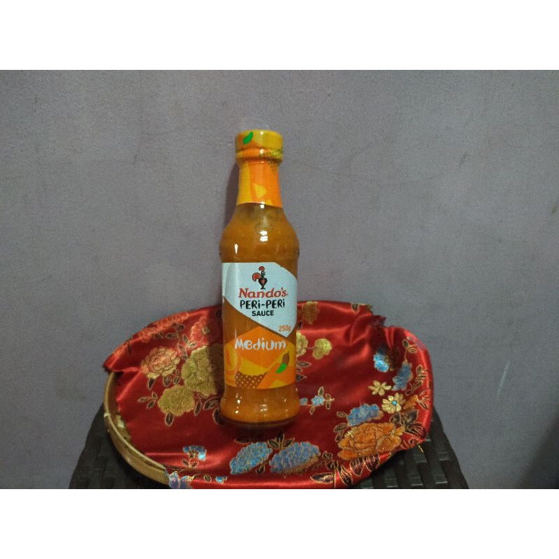 

nandos peri peri sauce medium 250gr saus