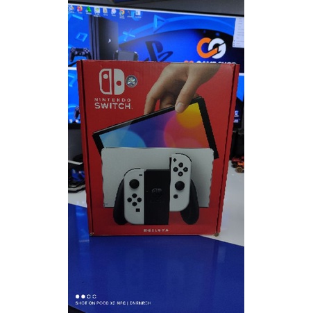 Nintendo Switch OLED White + game immortal fenyx