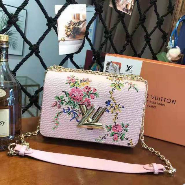 LV SLING TWIST BAG