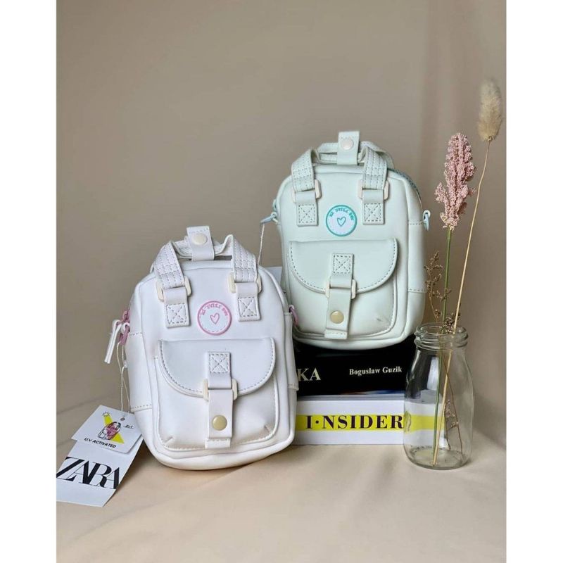 zara uv body cross bag tas selempang berubah warna