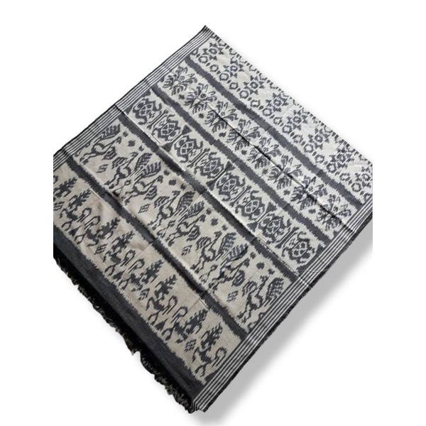Kain Tenun motif balik Hewan etnik
