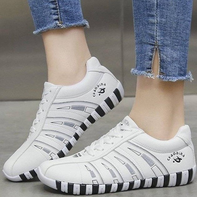 Kano style Sepatu wanita fashion PU bergaris kulit casual sepatu kets import