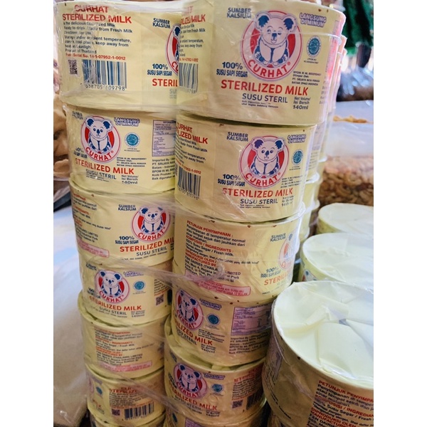 SUSU CAIR STERILIZED MILK CURHAT 1PACK 6 KALENG - susu steril import isi 6 kaleng