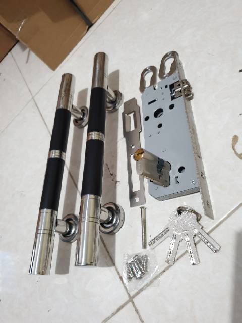 Paket handle pintu stainless 33cm bulat hitam 1set + kunci pelor belmondo