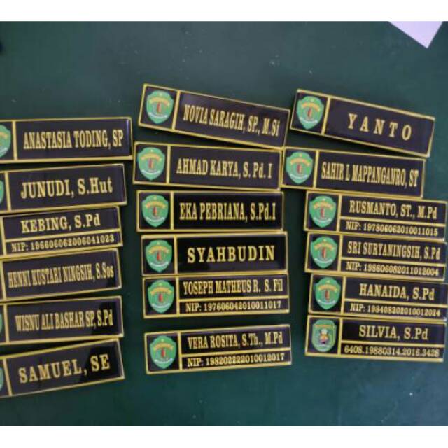 

Papan nama magnet