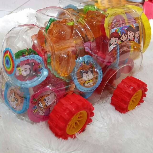

Jelly toples mobil-toples kereta-toples pesawat-isi-/+63pcs-murah-enak-tidak bikim batuk