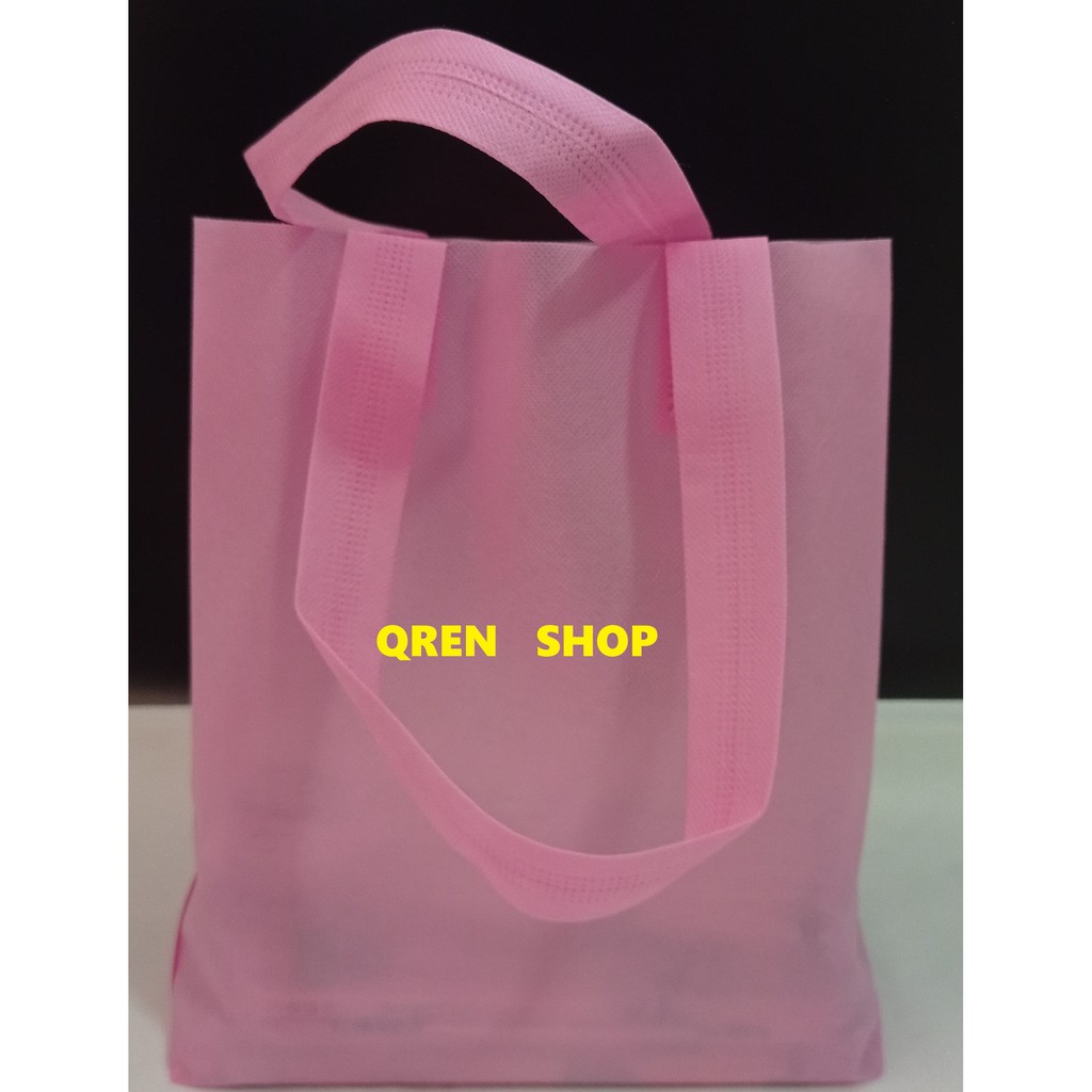 

TAS HANDLE MACHO 25X35/TAS SOVENIR ISI 12PCS