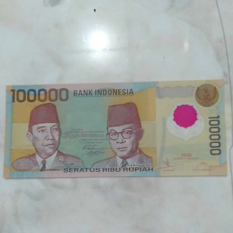 Uang Lama (Jadul) Rp 100.000 bahan plastik. Soekarno-Hatta dan Gedung DPR MPR