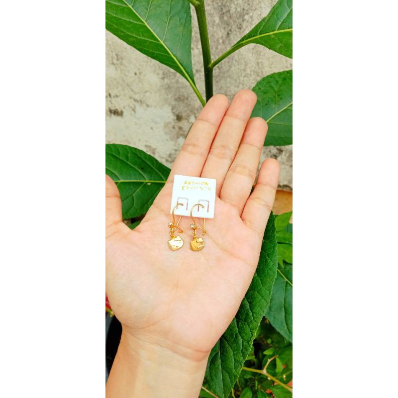 anting anak berbahan koin uang 1991