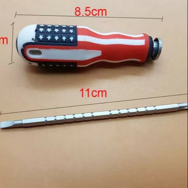 Obeng bolak balik model American . Obeng min dan plus